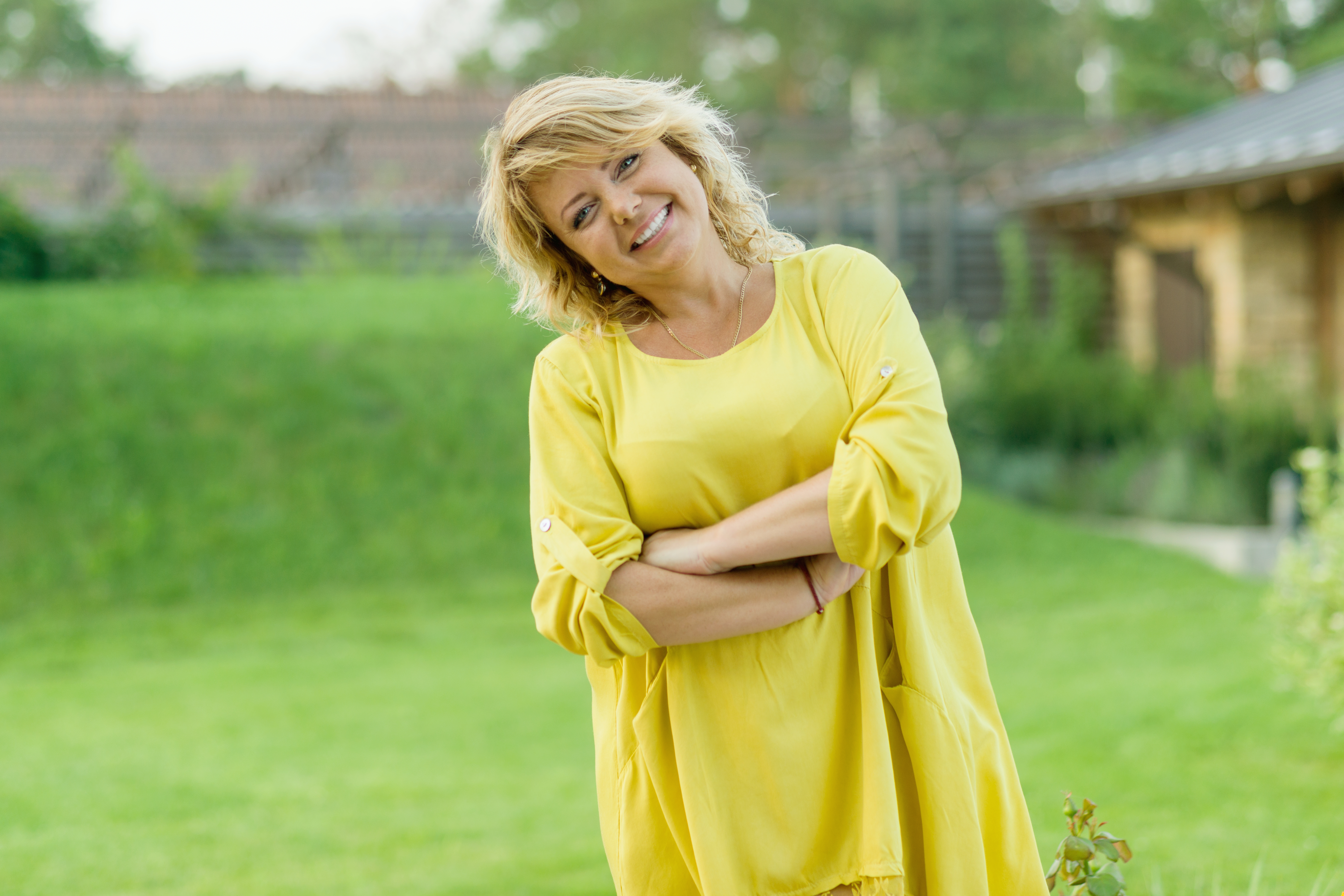 Happy woman with fingers up for top result